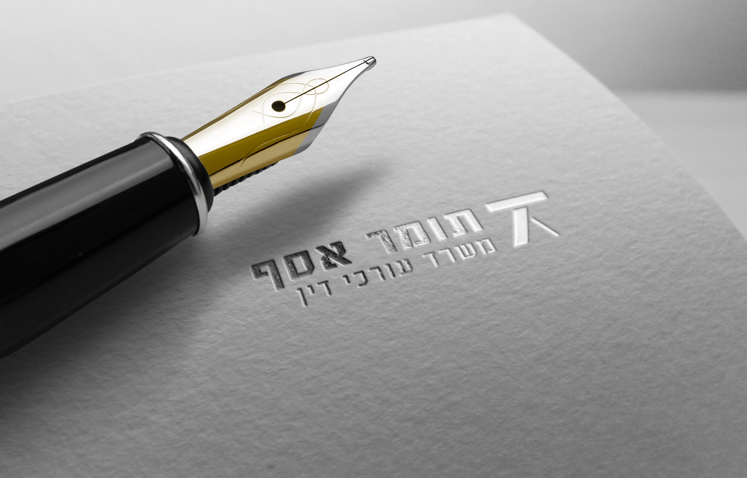 מוקאפ זהות המותג של משרד עו״ד תומר אסף